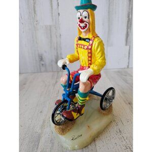 Ron Lee clown tricycle pretzels circus 1999 vintage statue figurine yellow
